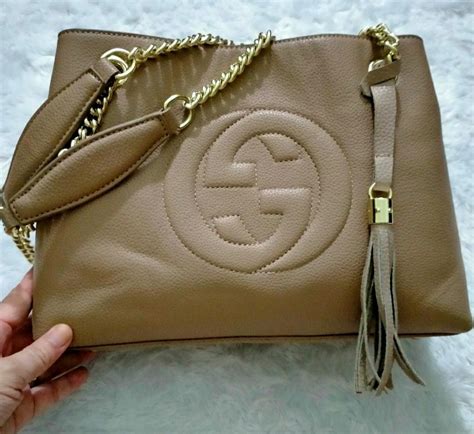 borsa gucci controllato|Gucci bag counterfeit logo.